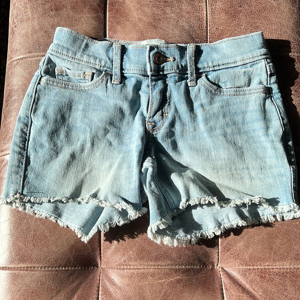 Light colored denim, raw hem midi short by Abercrombie kids